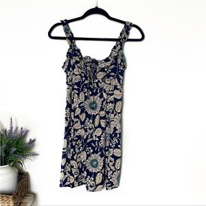 Angie Sleeveless Floral Dress with ruffle detail and keyhole tie at bust